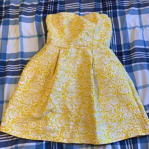 Yellow and white flower print formal mini strapless dress with pockets